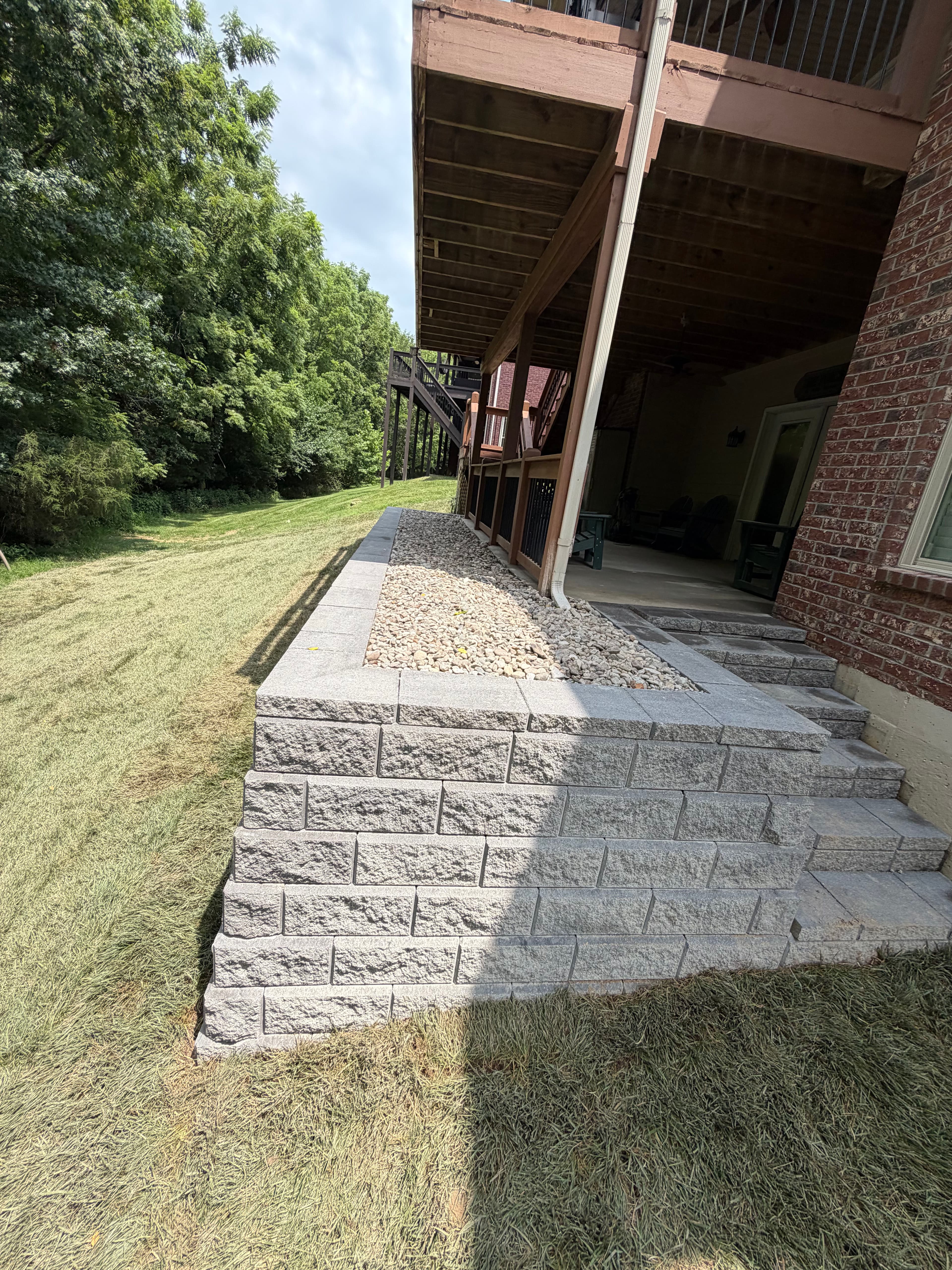 Project Retaining Wall Replacement With Steps and Decorative Rock image