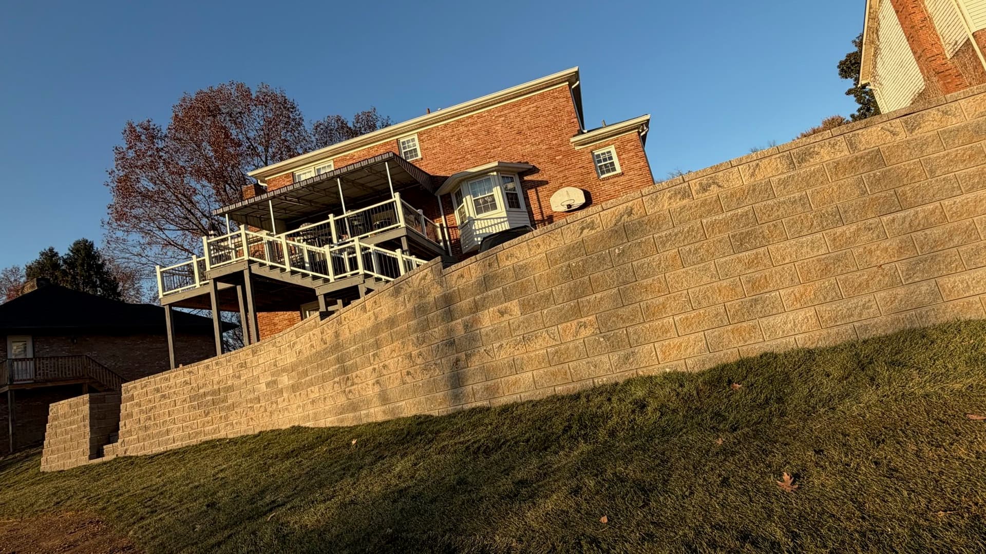 Transforming Slopes with a Stunning Retaining Wall image