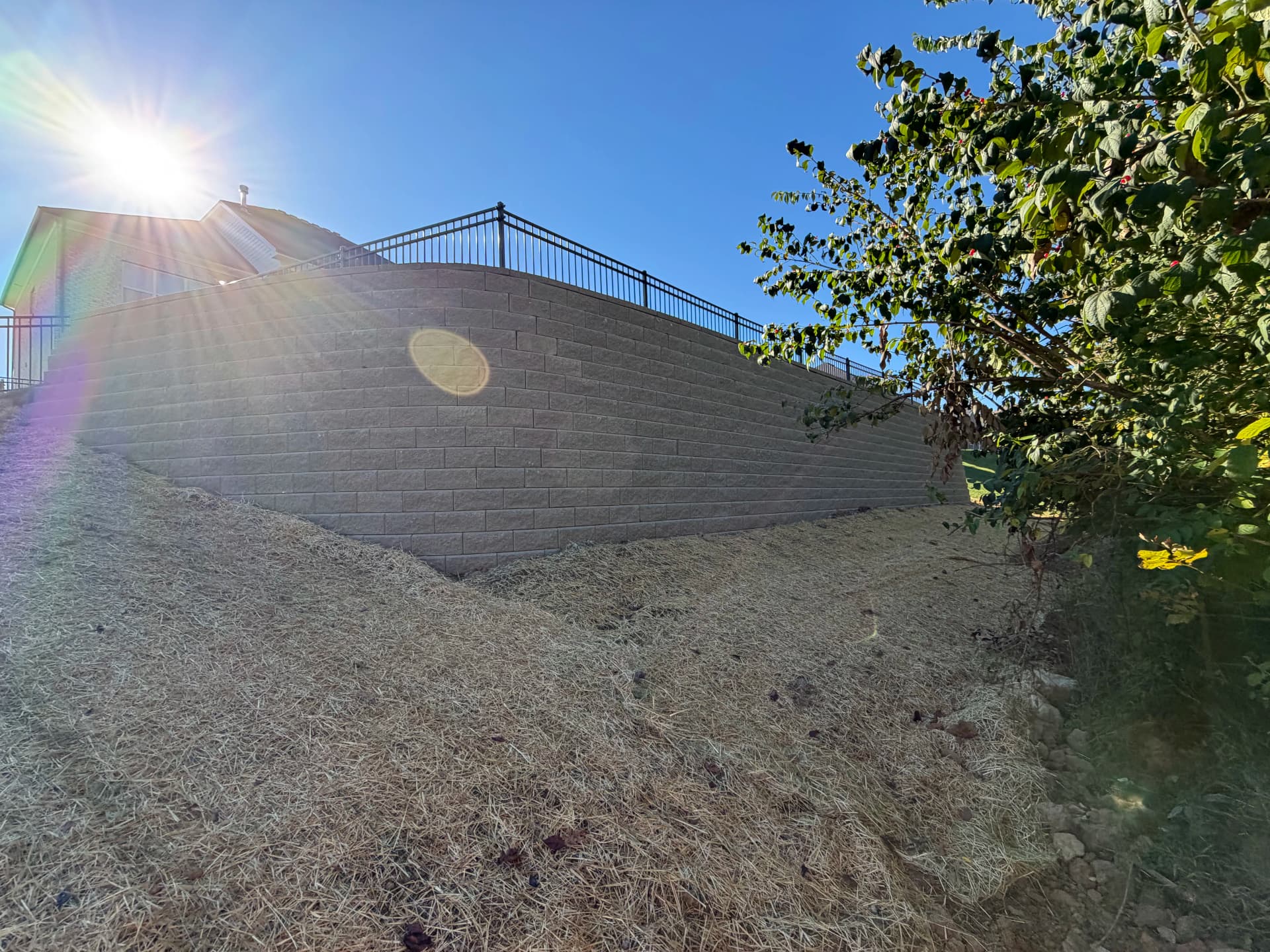 Gallery photos for Big Block Retaining Wall Turns a Sloped Backyard Into Usable Space: Image #4