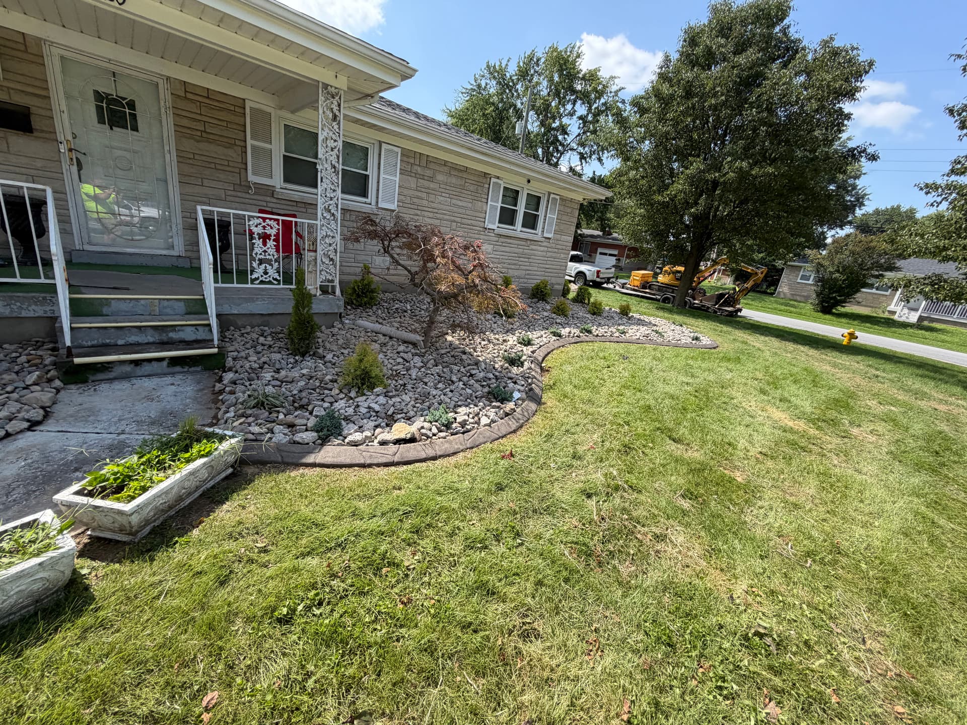Gallery photos for Full Front Yard Landscape Renovation with Rock Beds and Clean Edging: Image #2
